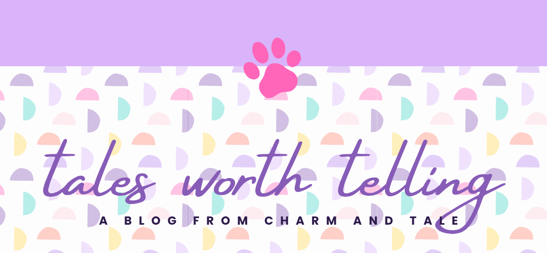 Banner with 'tales worth telling' text and paw print on a colorful patterned background