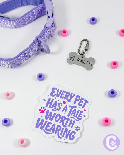Pet collar with tag, charm, and decorative beads on a light background